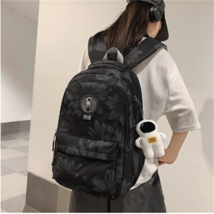 新款大容量暗纹书包减负护脊中学生双肩包高中生轻便男女同款背包