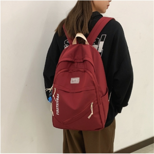 2023春季小清新纯色字母休闲高中生日系学院风韩版情侣学生双肩包